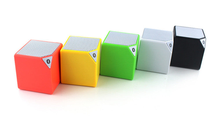 Rubik's Cube Bluetooth speakers in red, yellow, green, white, and black with top mesh