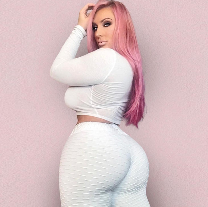 White scrunch leggings with textured lift pattern and high-waist coverage