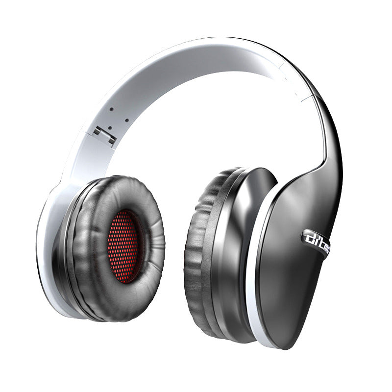 Wired gaming headset with white over-ear pads and black speaker grille