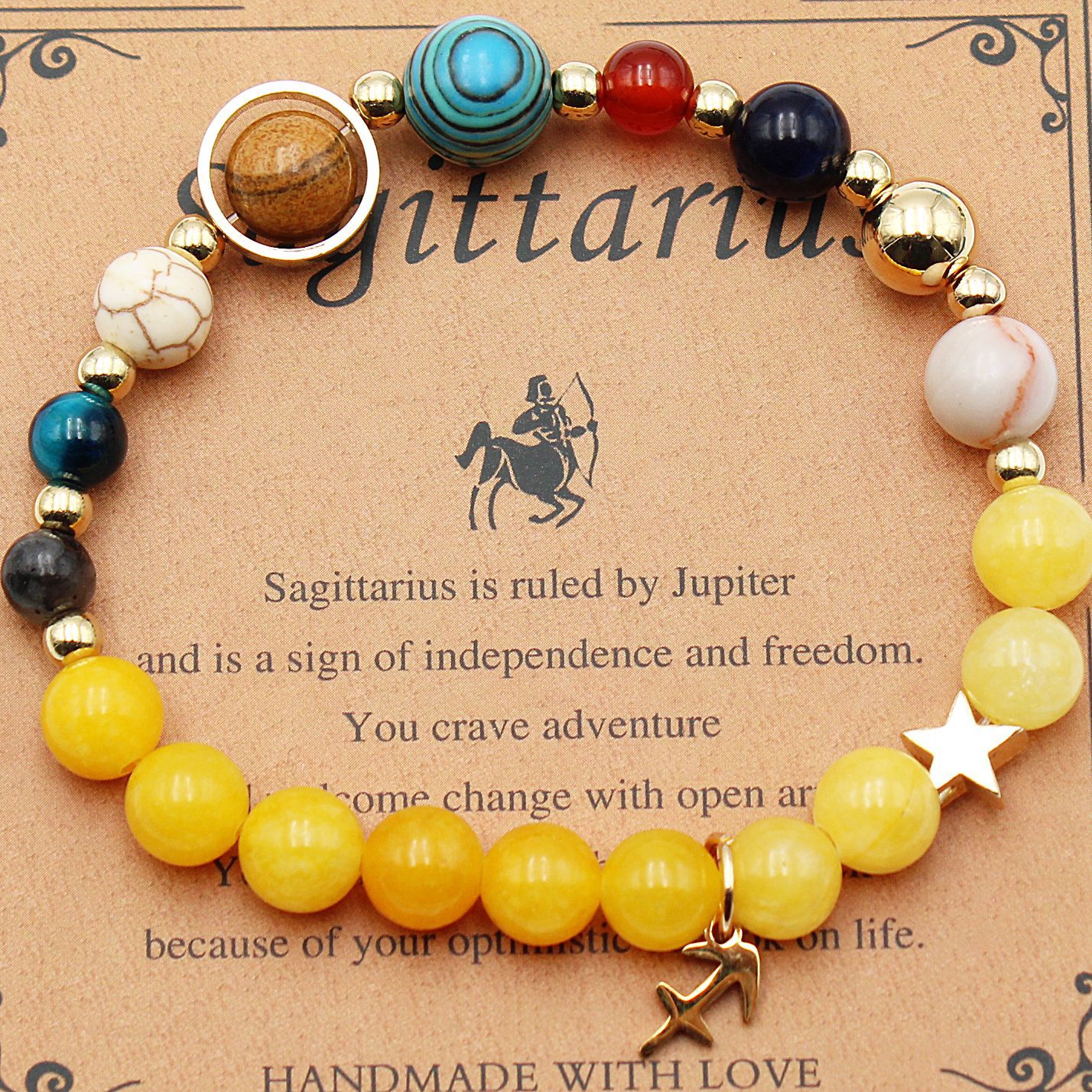 Sagittarius zodiac beaded bracelet with yellow beads, multicolor accents, and gold star charm