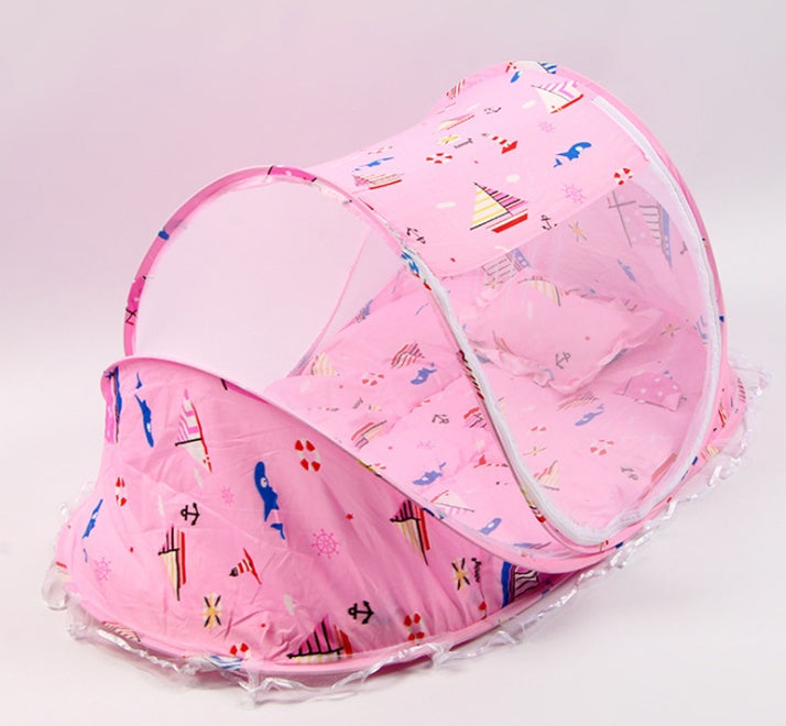 Foldable baby bed net set in pink, patterned mesh tent with arched opening and pillow insert