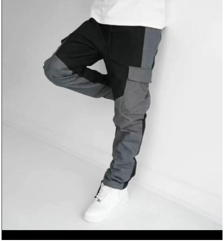 Men's loose-fit trousers with large stitched pockets, dark grey, ankle-length hems