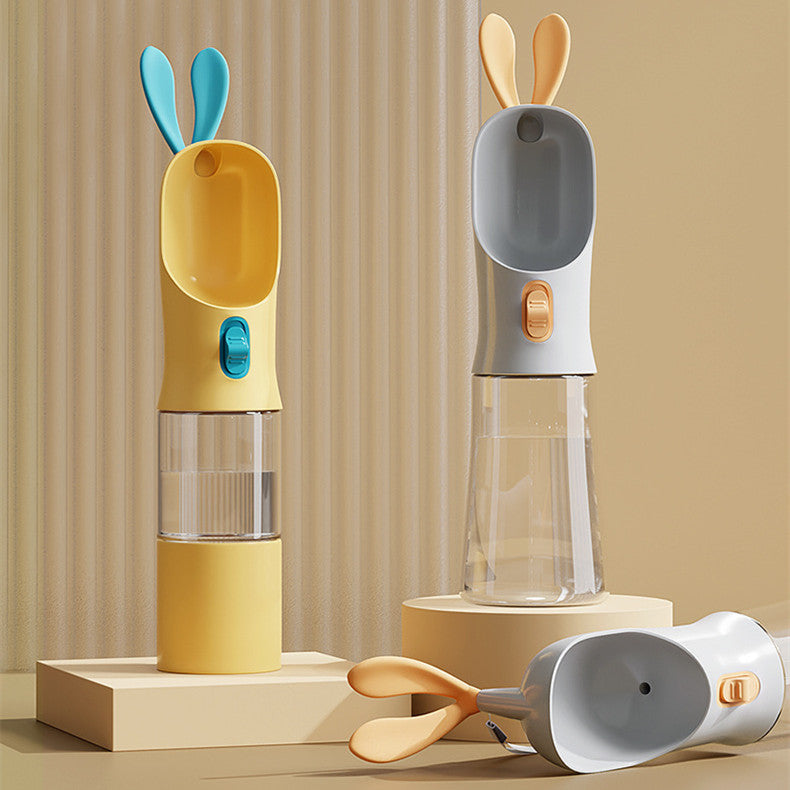 Pet water travel bottle with bunny-ear lid; yellow and grey with clear chamber