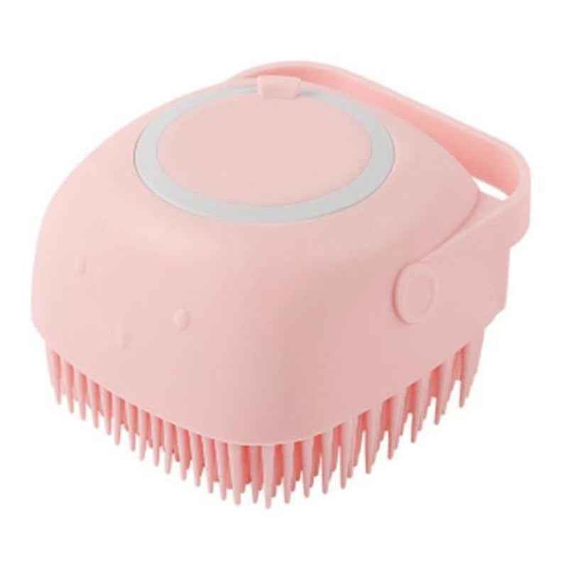 Pink silicone pet grooming brush with oval massage pad and dense bristle row