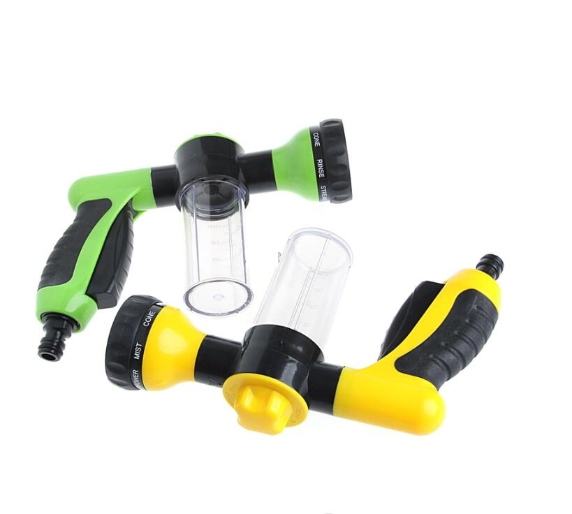 Foam spray gun set with green and yellow sprayers and clear foam containers