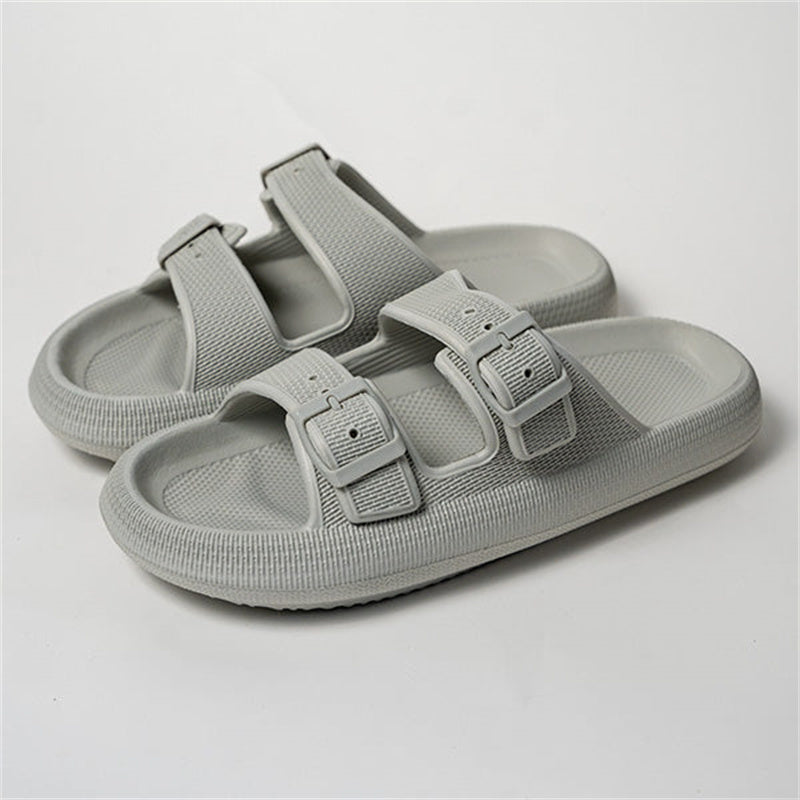 Light grey thick-soled EVA slide sandals with two adjustable buckle straps