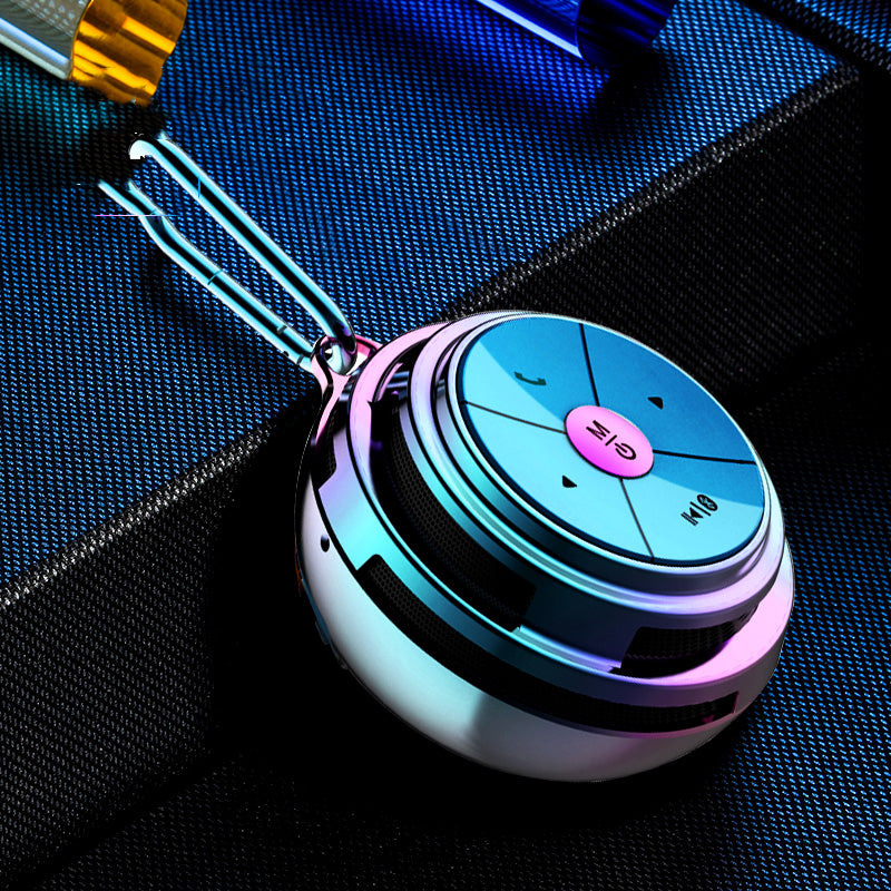 Portable Bluetooth speaker, light blue shell with purple LED ring and control buttons