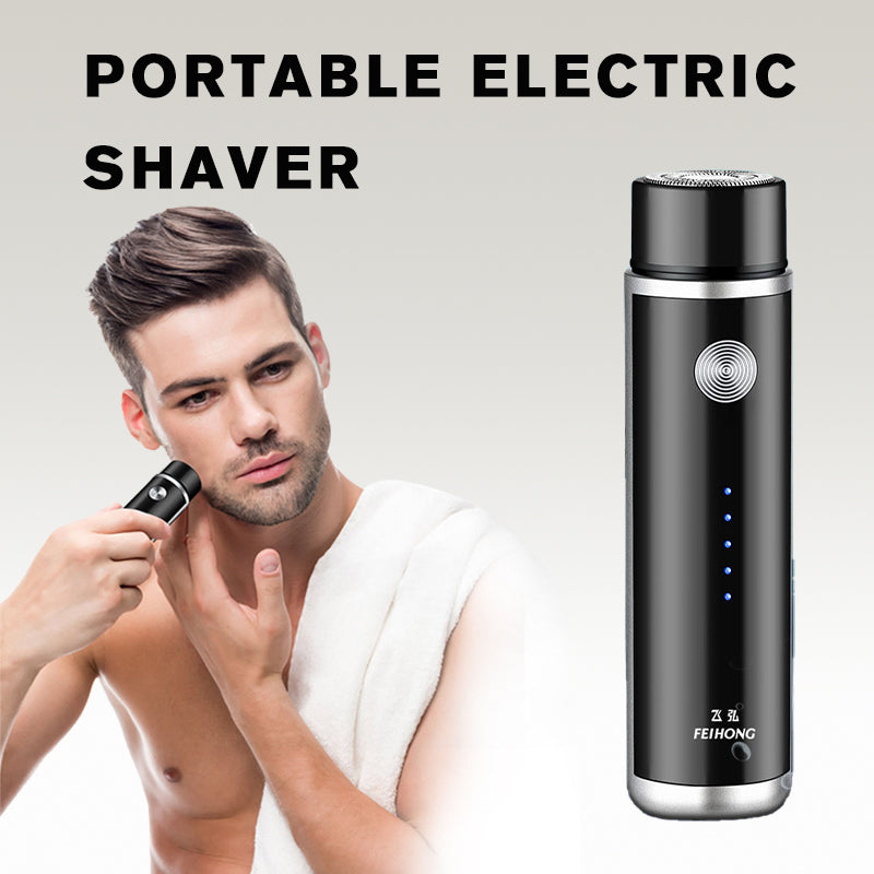 Black portable electric mini shaver with circular foil head and power button.