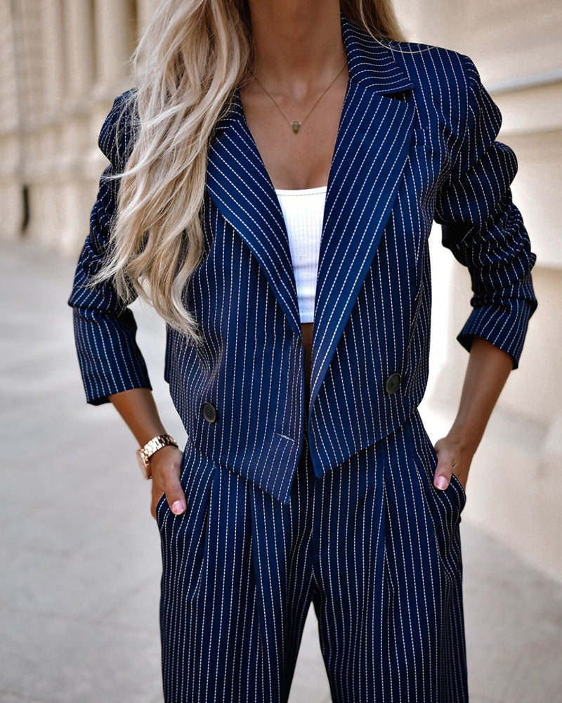 Navy pinstripe blazer and straight-leg pants set with dark buttons