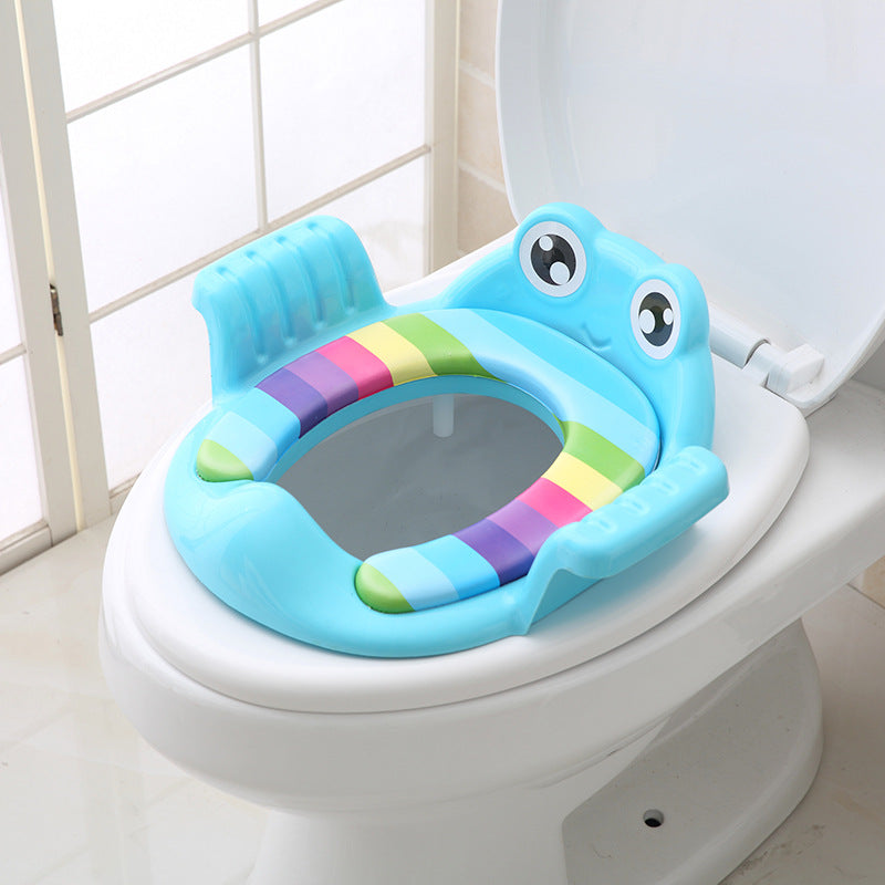 Kids toilet training seat in blue with rainbow arch, cartoon face, raised handles