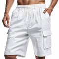 White linen cargo shorts with elastic waistband and drawstring, side flap pockets