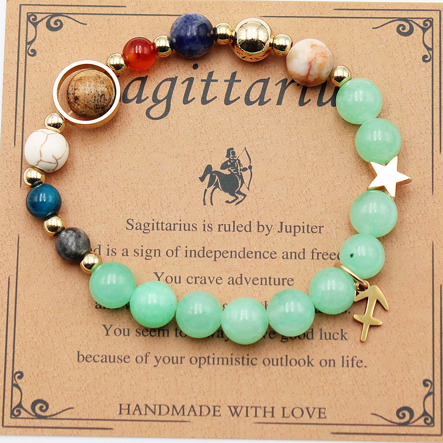 Beaded zodiac bracelet with mint green beads, gold spacers, star charm and arrow-shaped charm
