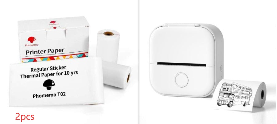 Mini thermal label printer with white body and two paper roll packs with sample label
