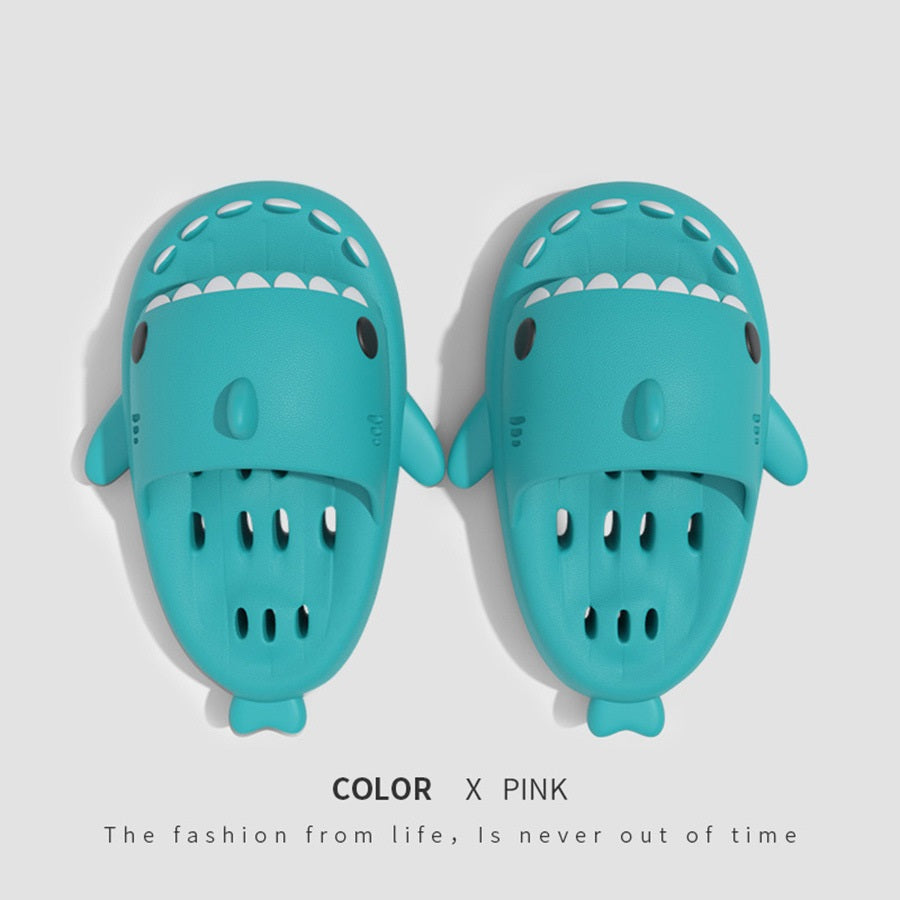 Shark EVA shower slides with drain holes, teal cartoon design