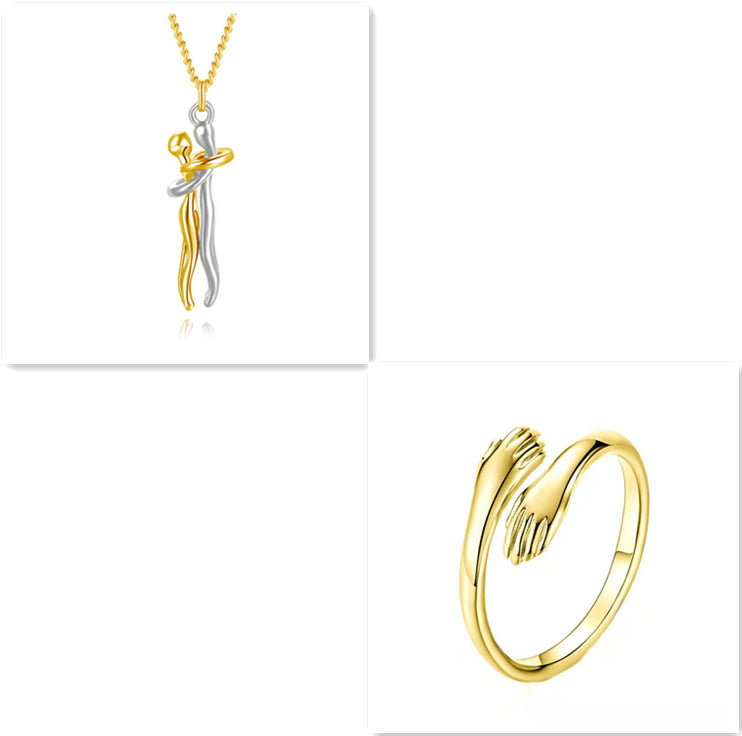 Gold hug-pendant necklace with gold chain and gold-tone ring, curved engraved design