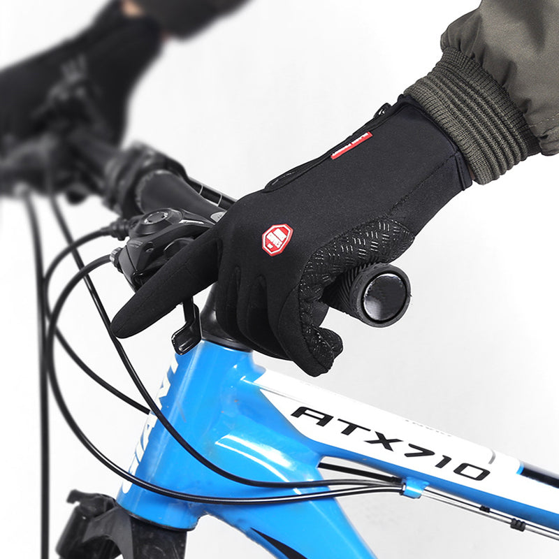 Winter riding gloves, black with textured grip palm and adjustable knit cuff strap.