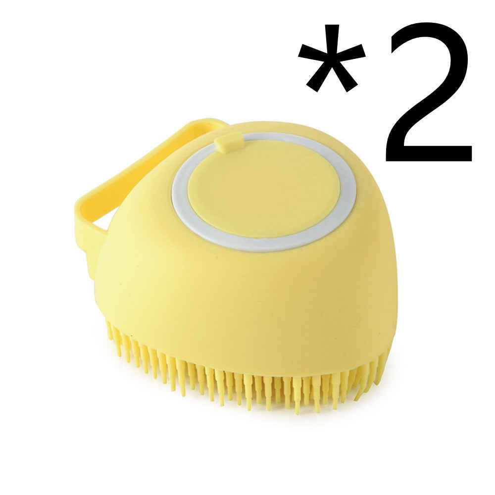Yellow silicone pet bath brush with circular lid and flexible bristles
