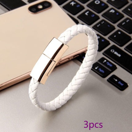 White braided charging cable bracelet with rose-gold metal clasp and USB connector