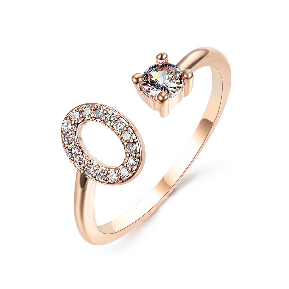 Rose gold initial letter ring with pavé rhinestones and round center crystal