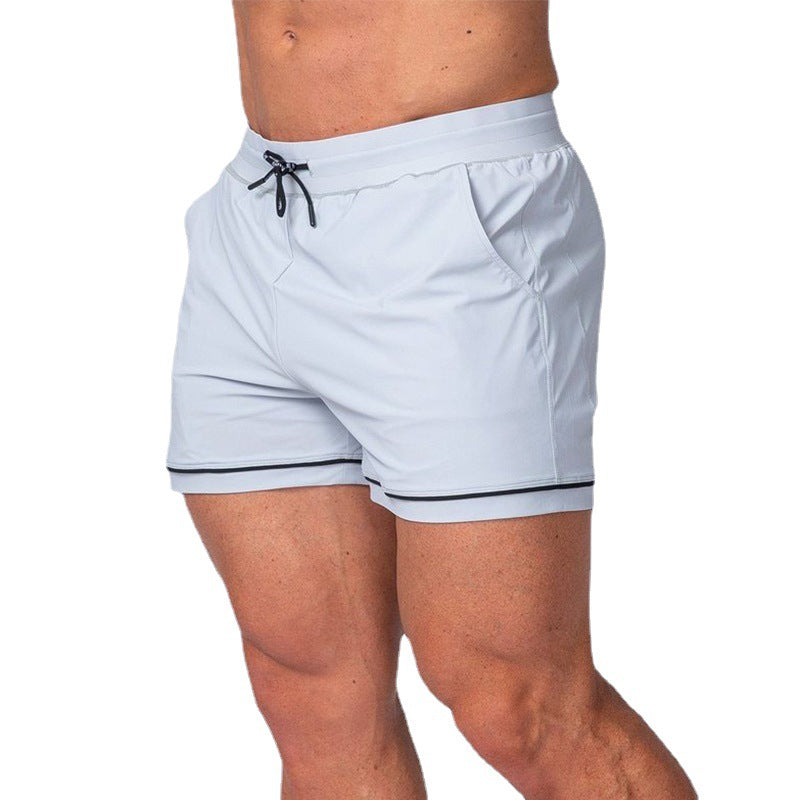 Quick-drying sport running shorts in white, elastic waistband with black drawstring