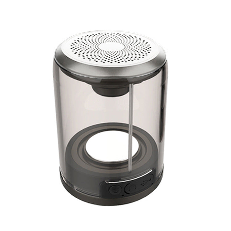 Bluetooth speaker with transparent cylinder body and light top grille, round magnetic base