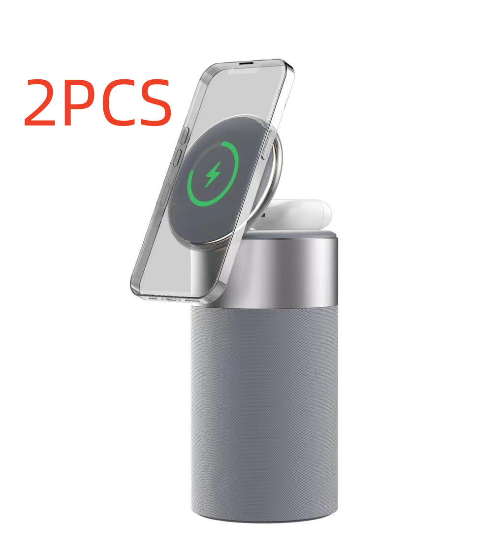 3-in-1 wireless charger speaker with lamp, phone and earbuds on dock, grey cylinder base