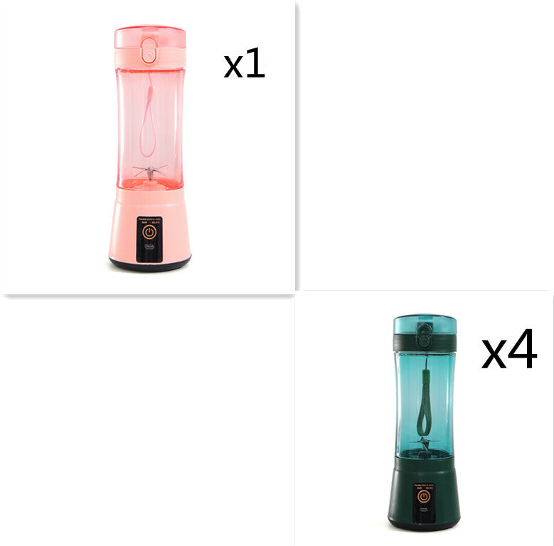 Portable electric fruit juicer with pink blender cup and teal blender cup