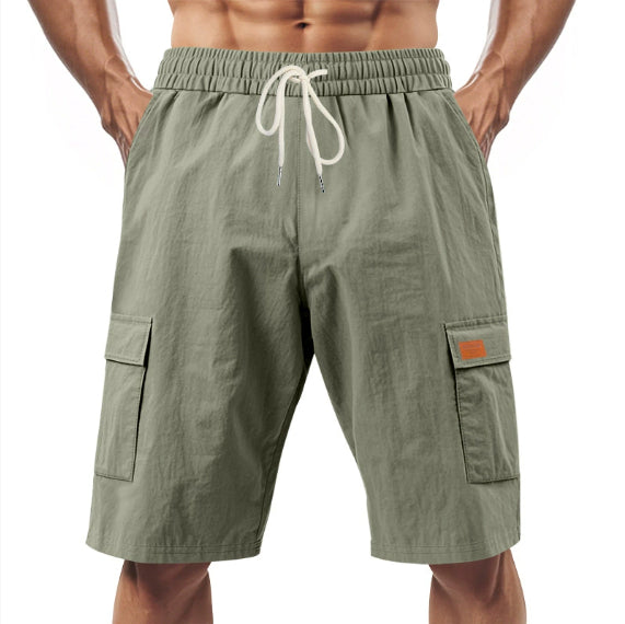 Olive linen drawstring cargo shorts with elastic waistband and side cargo pockets
