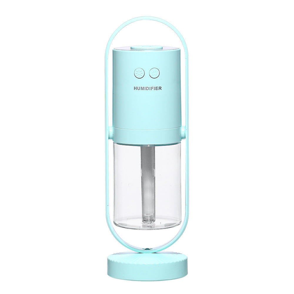 USB air humidifier in light blue with clear water tank and base