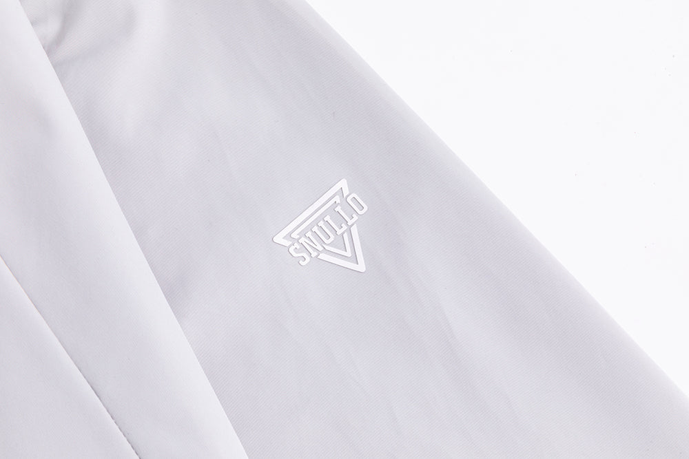 Assault suit jacket logo on white fabric panel
