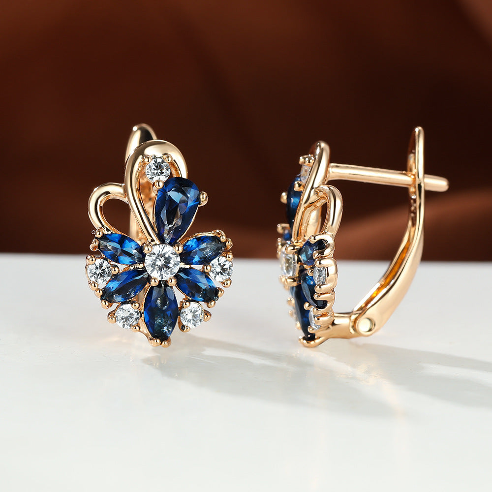 Gold flower drop zircon earrings with blue and clear stones