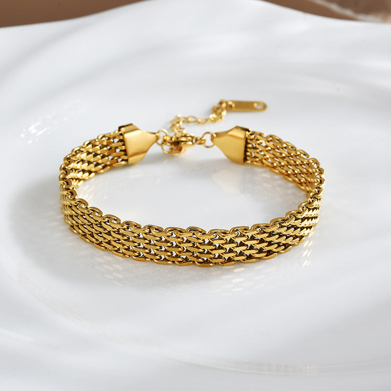 Gold chain bracelet with toggle clasp, layered link mesh design