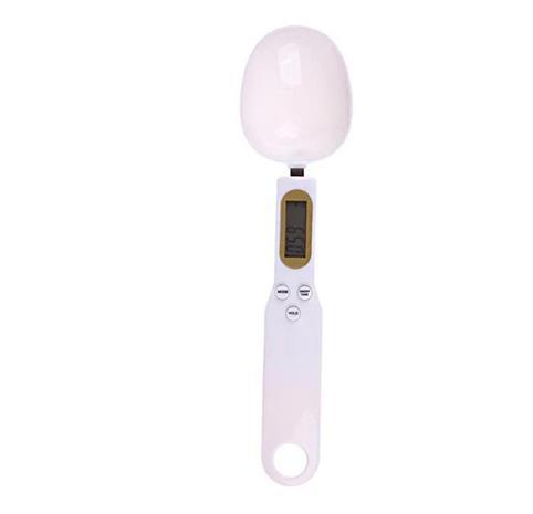 Light pink measuring spoon scale with oval round spoon and LCD display.