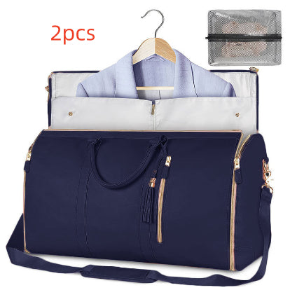 Navy and white foldable travel duffle bag with front zipper and shoulder strap