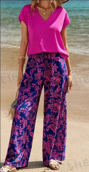V-neck short-sleeve top and floral wide-leg pants, magenta top with dark blue print