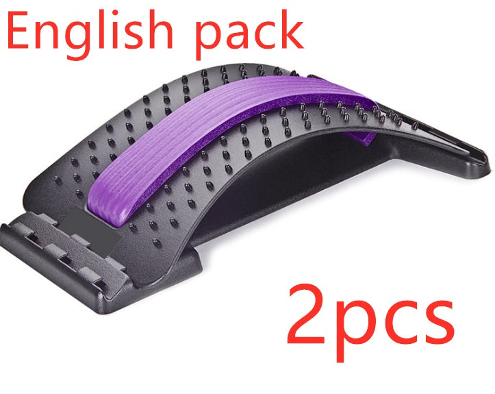 Lumbar traction therapy back brace with purple ribbed pad on black dotted base