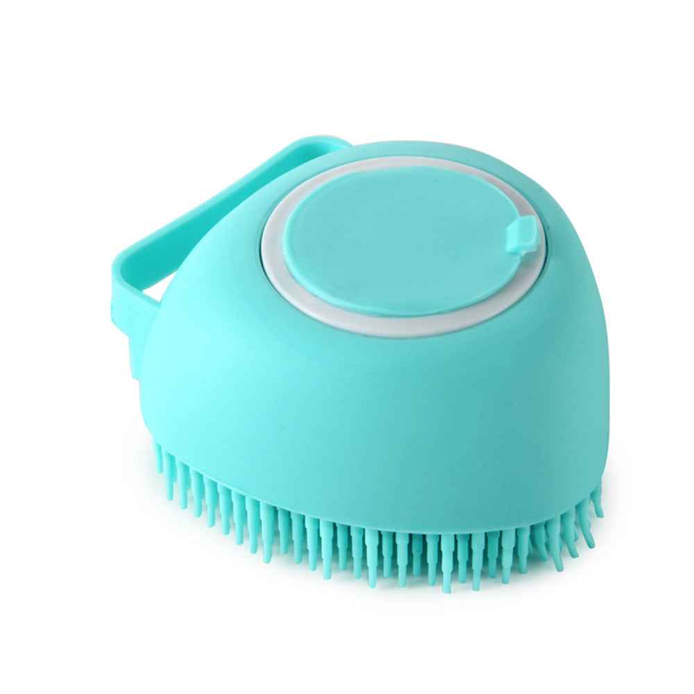Teal silicone pet grooming brush with oval massage pad and short bristle tips