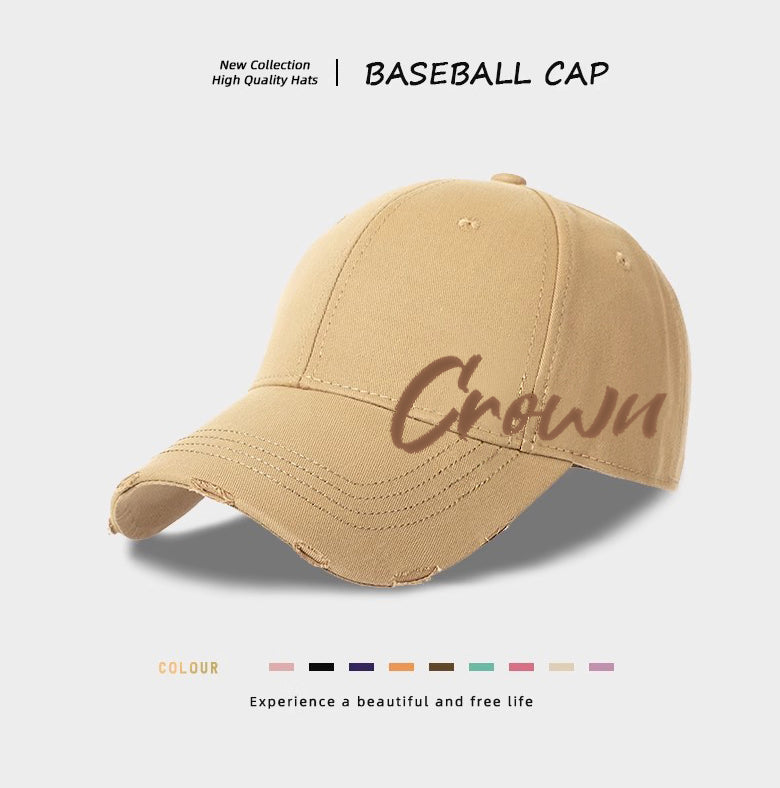 Tan baseball cap with Crown logo embroidery