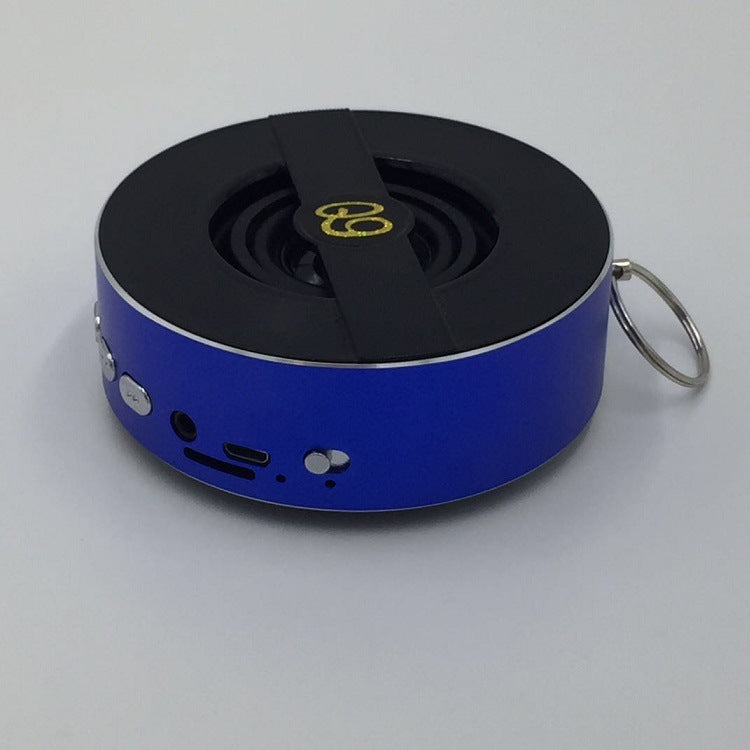 Outdoor Bluetooth speaker, blue with black top and carrying strap