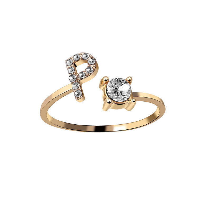 Gold adjustable initial letter ring with round crystal and openwork crystal letter