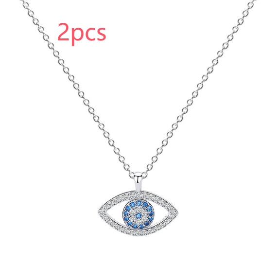 Sterling silver evil eye pendant necklace, blue circular eye framed by pavé setting