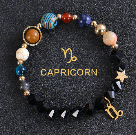 Zodiac beaded bracelet with black faceted beads, gold spacers, Capricorn charm and star