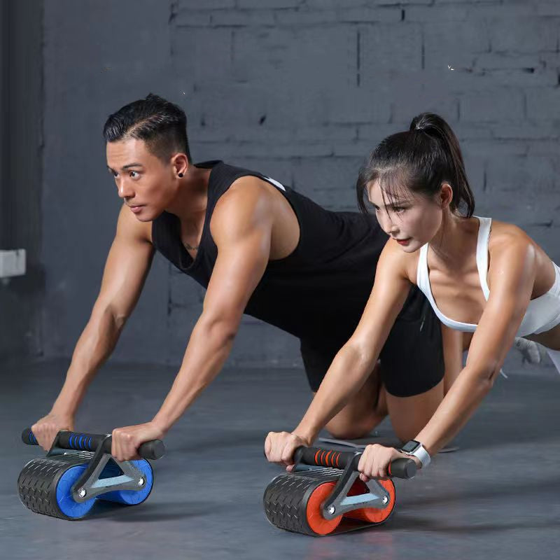 Workout with AB rollers: man kneeling on blue and woman on red roller