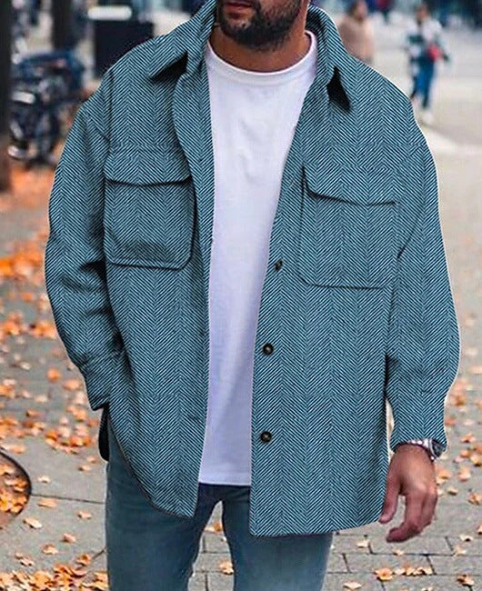 Men's polo-collar coat shirt in blue herringbone with button front and flap chest pockets.
