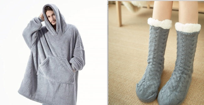 Grey hooded fleece sweatshirt and light blue cable socks with white cuffs