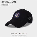 Black baseball cap with blue-and-gold zodiac emblem on front, minimalist side icon