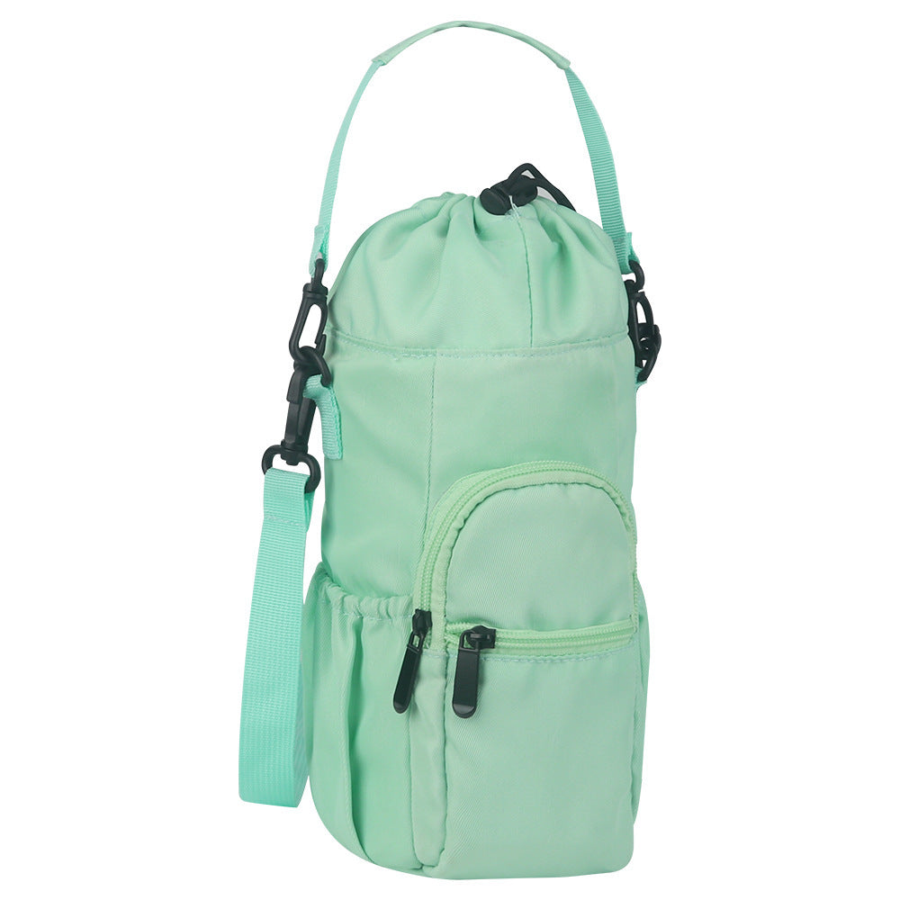Mint green bottle pouch shoulder bag with drawstring top and front zip pocket