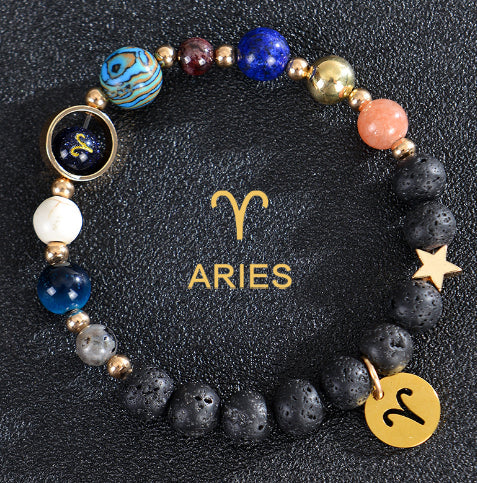 Aries zodiac beaded bracelet with black lava stones and gold Aries medallion charm