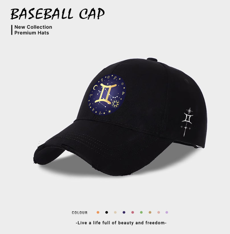 Black baseball cap with blue-and-gold zodiac emblem on front, white side zodiac symbol