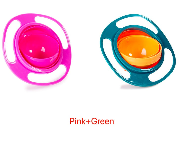 Pink and teal rotating spill-proof bowl dishes with magenta and orange inserts.